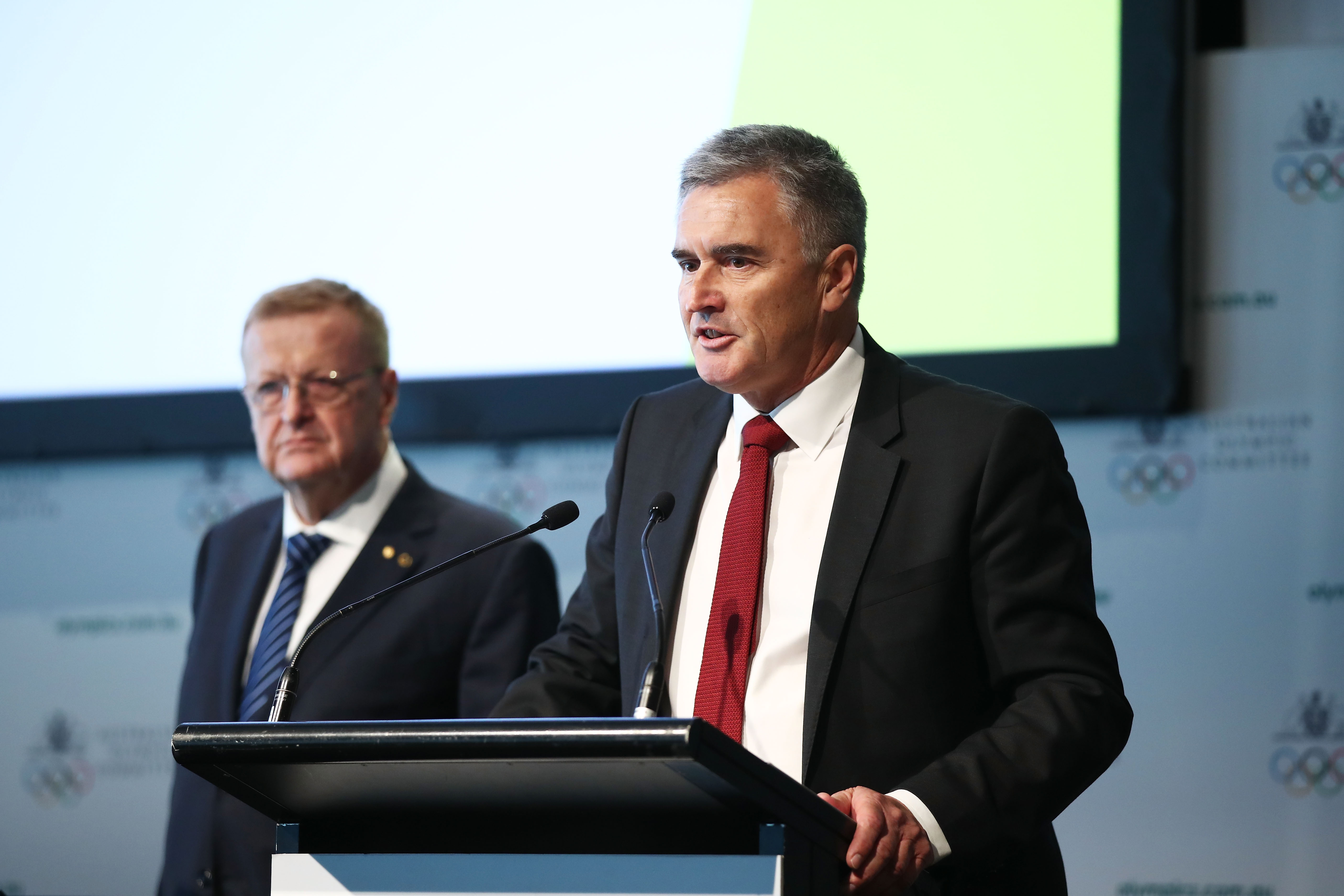 AOC outgoing president John Coates AC, left, and incoming president Ian Chesterman AM