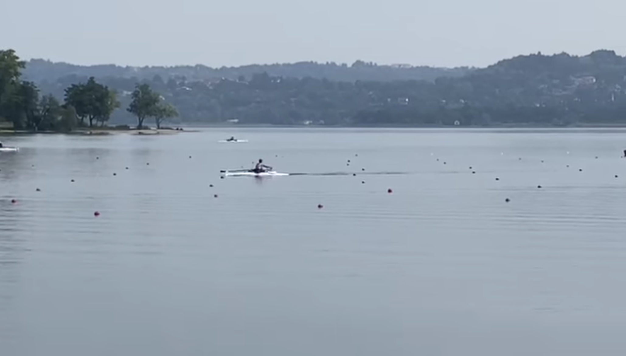 A rower on the lake rowing