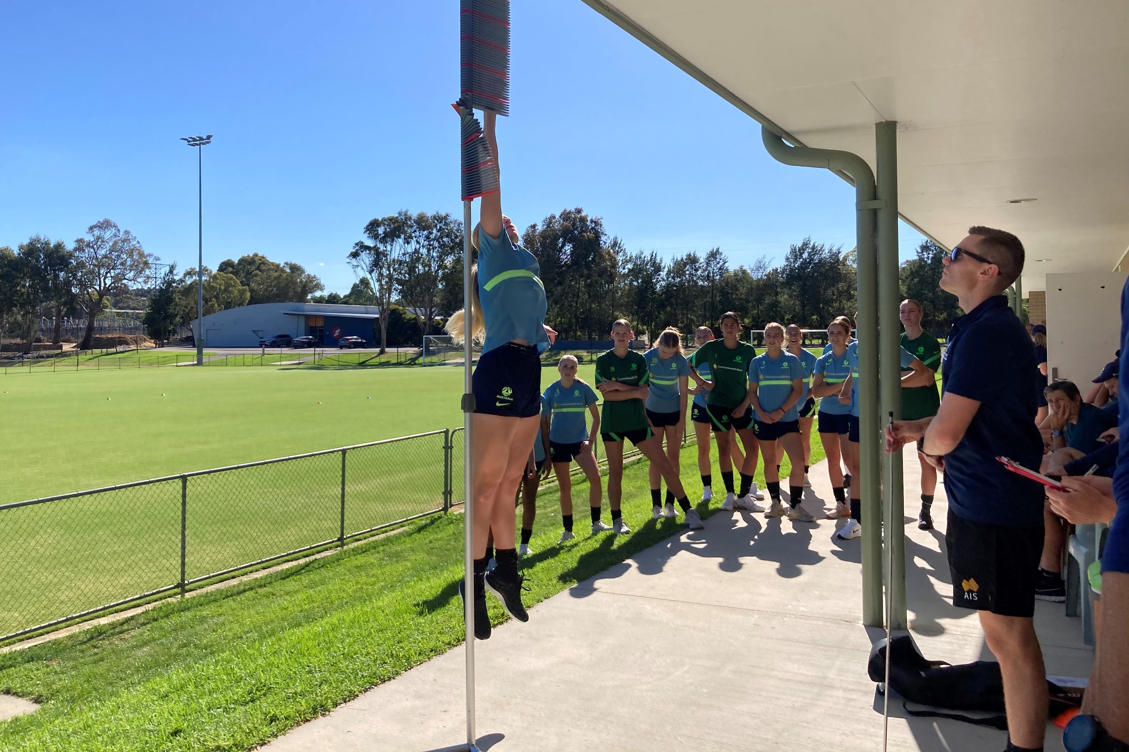 A Junior Matilda doing a vertical jump test with the AIS Performance Services team.