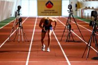 Athlete Robbie Crowther on the indoor running track 2009