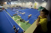 AIS Gymnasium hall, kids watching on as athletes train 2013