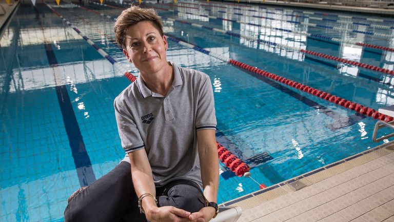 Tracey Menzies-Stegbauer sitting by pool