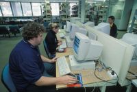 Rhys Jones and Claire Woods using the National Sport Information Centre computers 2003