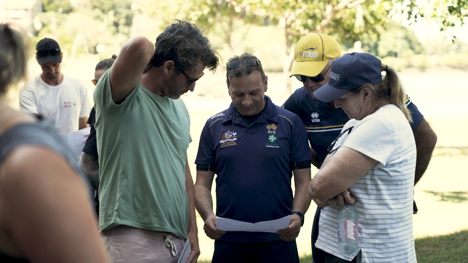 Participants standing together to undertake an outdoor challenge