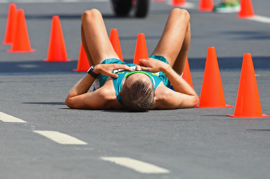 Tallent lying on road