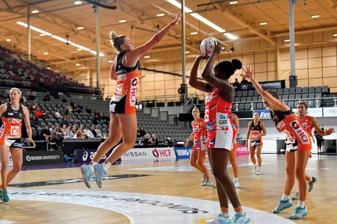 Giants Netball star Matilda (Tilly) McDonell defending a shot from the opposition.