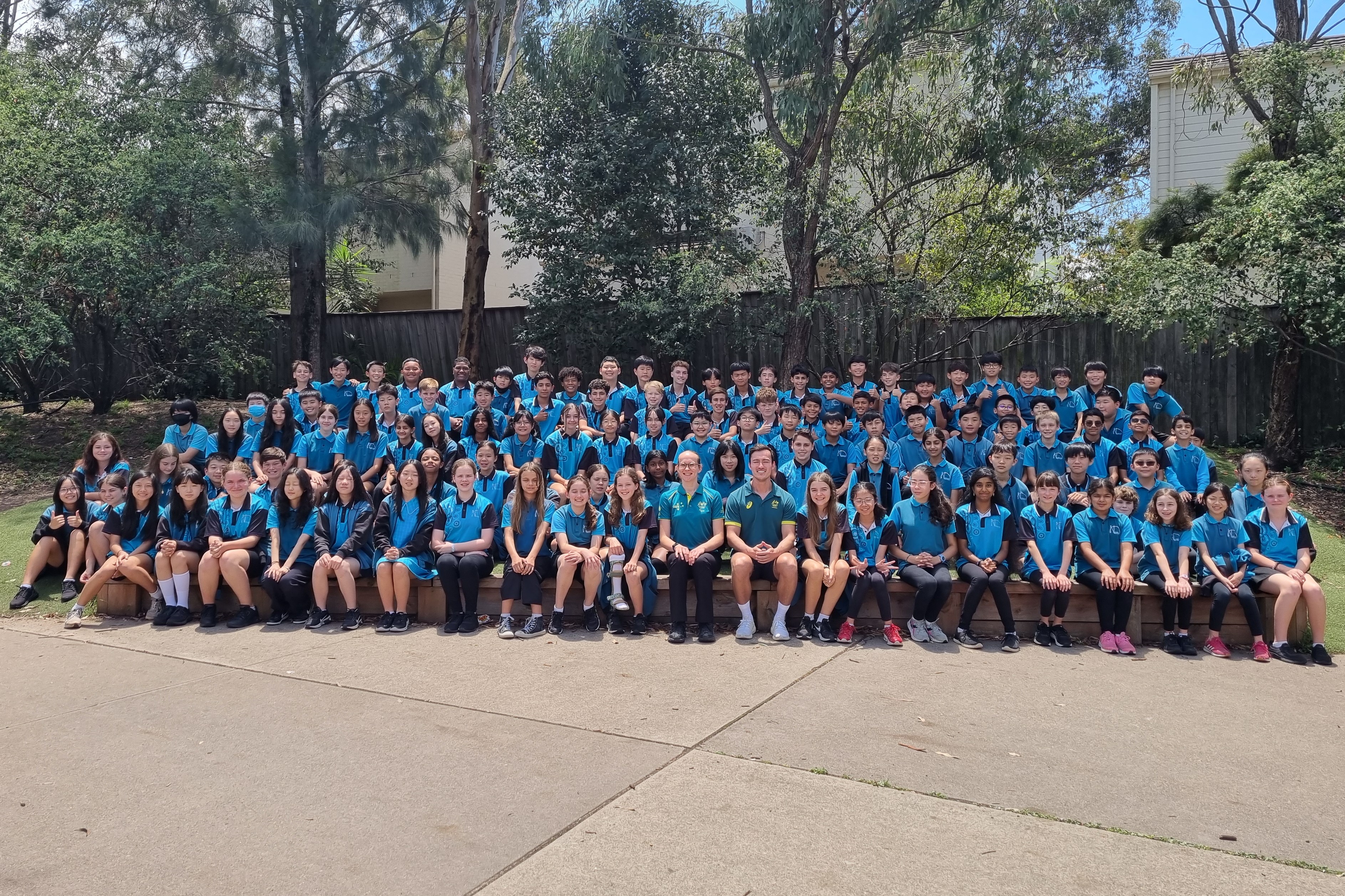 Big group shot with Timmings and Tamsin sitting in the middle.