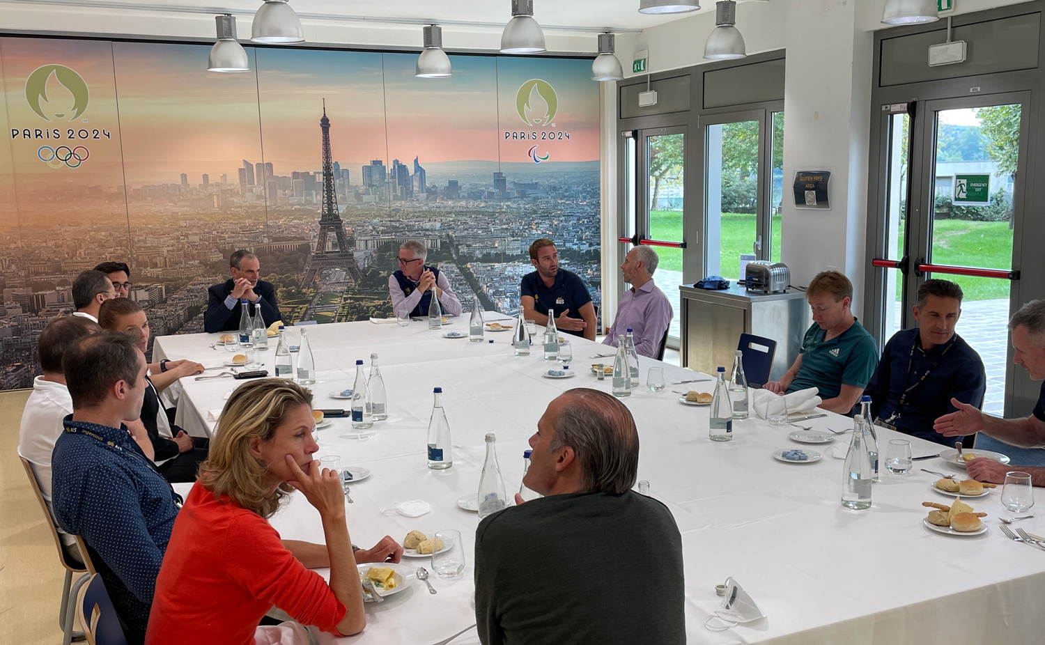 Image of people sitting around a table